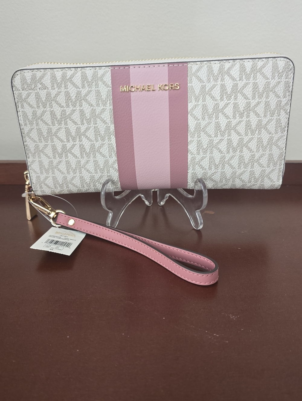 Michael Kors Beige Signature Wristlet with Pink Stripe